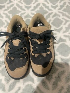 Jordan Tan and Black Low-Top Sneakers